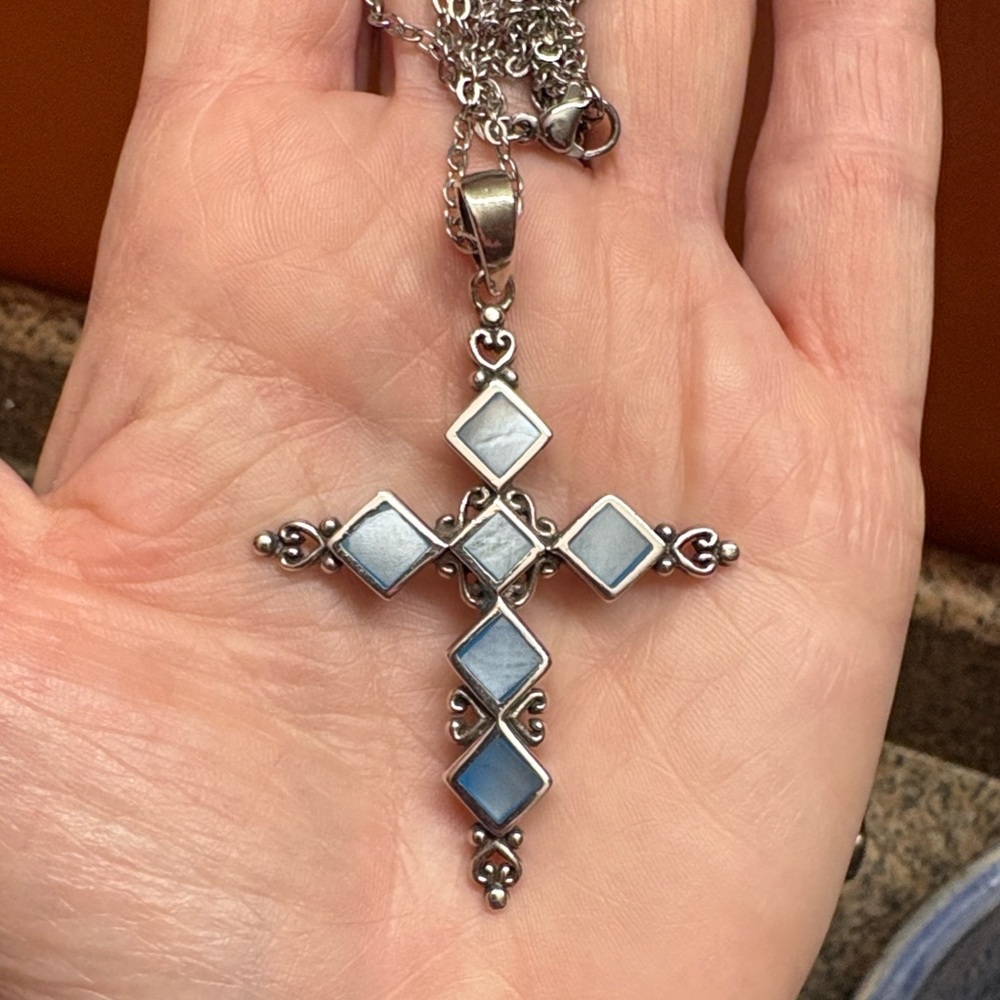 Silver 925, Mother of Pearl (blue) set in a Beautiful Filigree Cross.
GORGEOUS